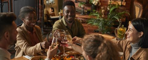 Group celebrating at dinner