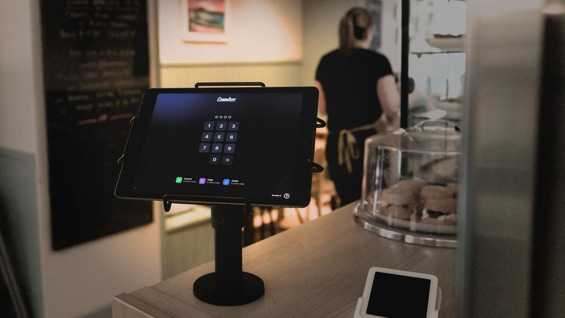 Seamless POS soft drinks menu interface on iPad in restaurant setting