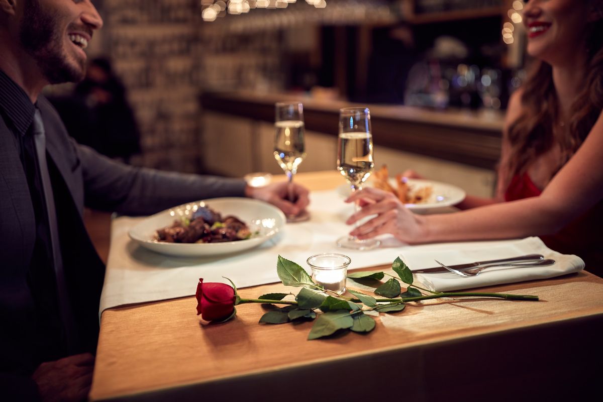 Table with a rose and candles